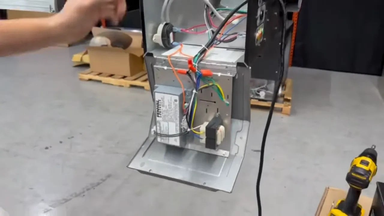 Open V3 service panel exposing the transformer and internal wiring